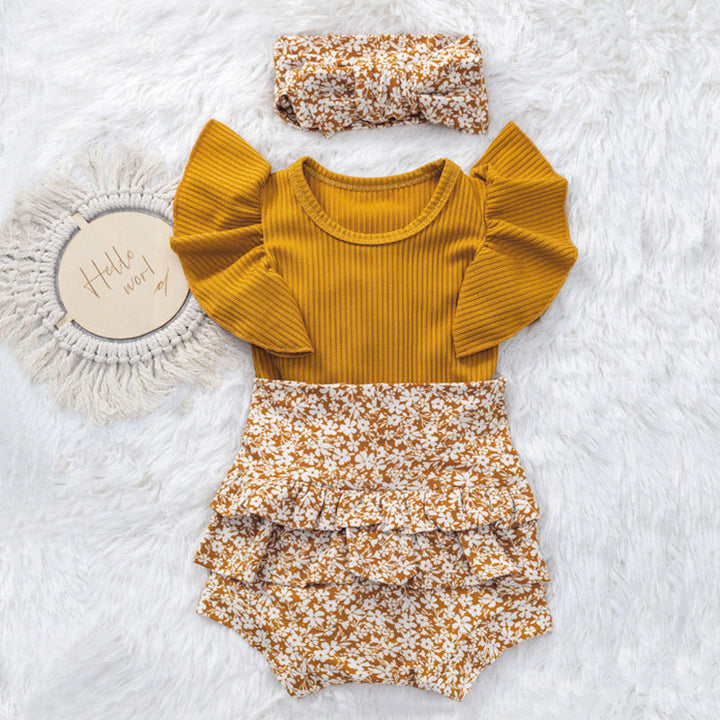 Discover the Joy of Dressing Your Little One in Our Flounced Sleeve Triangle Rompers Suit